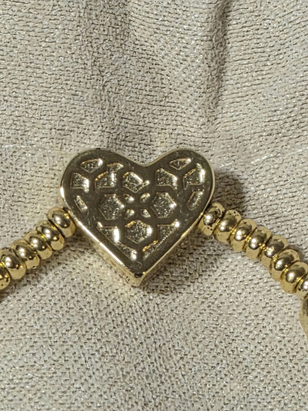 Kendra Scott Gold Ari Stretch Bracelet With Ivory Mother of Pearl Heart Accent - Picture 5 of 7
